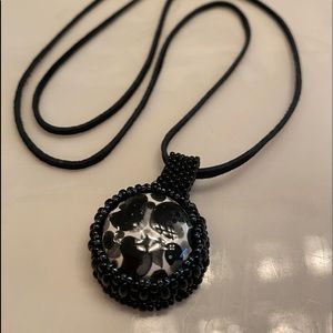 Long necklace with pendant